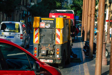 Seville Spain July 23, 2021 Garbage truck driving through the streets of Seville, an emblematic city and the capital of the region of Andalusia, in the south of Spainの写真素材