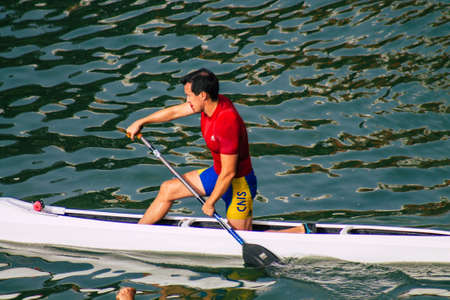 Seville Spain July 23, 2021 Unidentified people rowing on the Guadalquivir river that crosses Seville during the coronavirus pandemic affecting Spainのeditorial素材