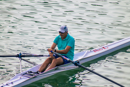 Seville Spain July 23, 2021 Unidentified people rowing on the Guadalquivir river that crosses...