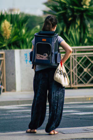Seville Spain July 23, 2021 Pedestrians walking in the street of Seville during coronavirus outbreak hitting Spain, wearing a mask in the street is not mandatory but most of people wear itのeditorial素材