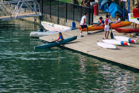 Seville Spain July 23, 2021 Unidentified people rowing on the Guadalquivir river that crosses...