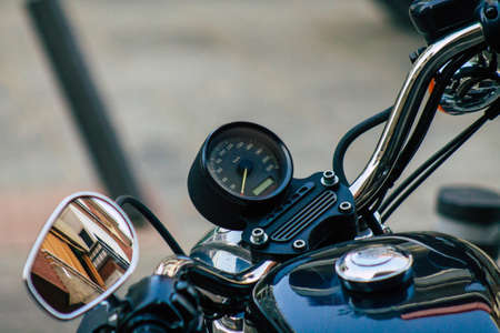 Seville Spain July 23, 2021 Harley Davidson 883 motorcycle parked in the streets of Seville, an emblematic city and the capital of the region of Andalusia, in the south of Spainのeditorial素材