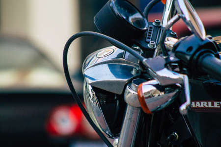 Seville Spain July 23, 2021 Harley Davidson 883 motorcycle parked in the streets of Seville, an emblematic city and the capital of the region of Andalusia, in the south of Spainのeditorial素材