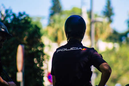 Seville Spain July 23, 2021 Police officer riding horse in the street of Seville during coronavirus...