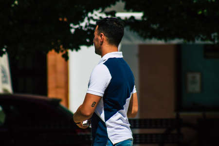 Carmona Spain July 24, 2021 Pedestrian walking in the streets of Carmona during the coronavirus outbreak hitting Spain, wearing a mask is not mandatory but most of people wear itのeditorial素材