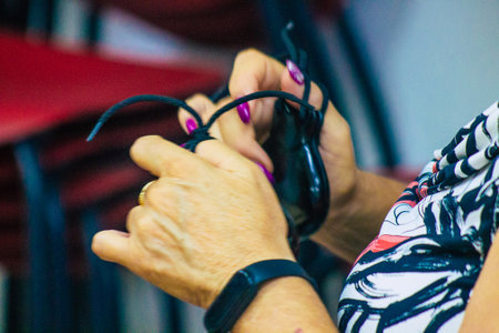 Seville Spain July 23, 2021 Closeup of the hands of castanets players, favorite musical instrument of flamenco dancers in Spain, gives rhythm and accompanies singingのeditorial素材