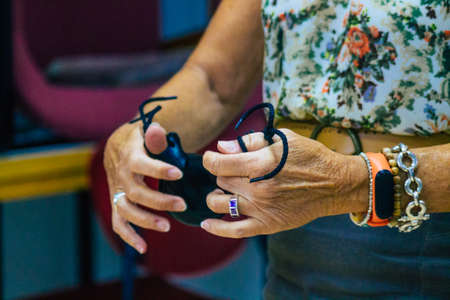 Seville Spain July 23, 2021 Closeup of the hands of castanets players, favorite musical instrument of flamenco dancers in Spain, gives rhythm and accompanies singingのeditorial素材