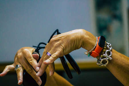 Seville Spain July 23, 2021 Closeup of the hands of castanets players, favorite musical instrument of flamenco dancers in Spain, gives rhythm and accompanies singingのeditorial素材