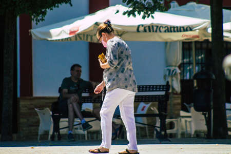 Carmona Spain July 24, 2021 Pedestrian walking in the streets of Carmona during the coronavirus...