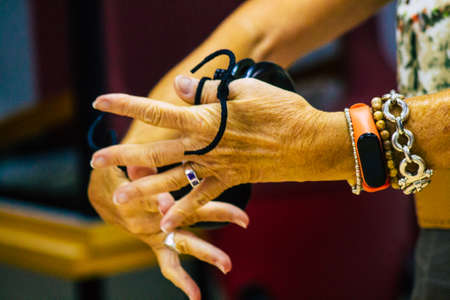 Seville Spain July 23, 2021 Closeup of the hands of castanets players, favorite musical instrument of flamenco dancers in Spain, gives rhythm and accompanies singingのeditorial素材