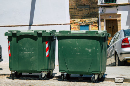 Carmona Spain July 26, 2021 Garbage container in the streets of Carmona called The Bright Star of Europe, the town shows a typical narrow and meandering Arabic layoutの写真素材