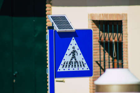 Carmona Spain July 26, 2021 Road sign, erected at the side of or above roads to provide information to road user in the typical narrow and meandering town of Carmona called The Bright Star of Europeの写真素材