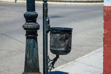 Carmona Spain July 26, 2021 Garbage container in the streets of Carmona called The Bright Star of Europe, the town shows a typical narrow and meandering Arabic layoutの写真素材
