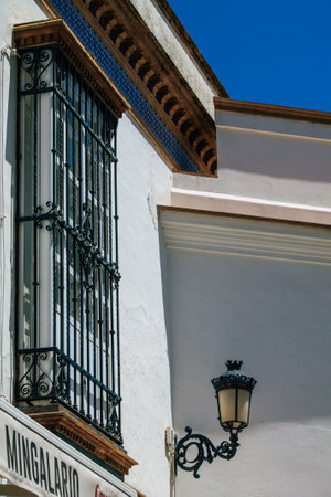 Carmona Spain July 28, 2021 Closeup of window of a old house in the narrow streets in town of Carmona, the town shows a typical narrow and meandering Arabic layoutの写真素材