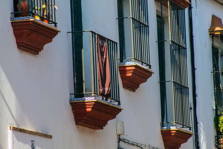 Carmona Spain July 28, 2021 Facade of old house in the streets of Carmona called The Bright Star of Europe, the town shows a typical narrow and meandering Arabic layoutの写真素材