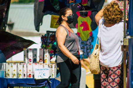 Carmona Spain July 26, 2021 Unidentified Spanish people with face mask shopping at local market in...