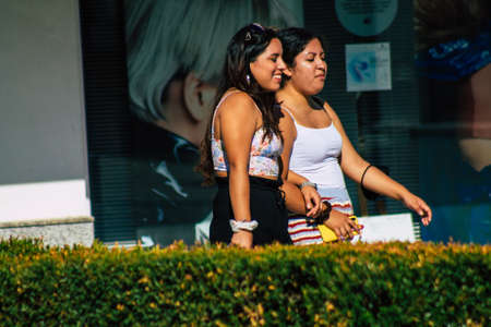 Carmona Spain July 26, 2021 Pedestrian walking in the streets of Carmona during the coronavirus outbreak hitting Spain, wearing a mask is not mandatory but most of people wear itのeditorial素材