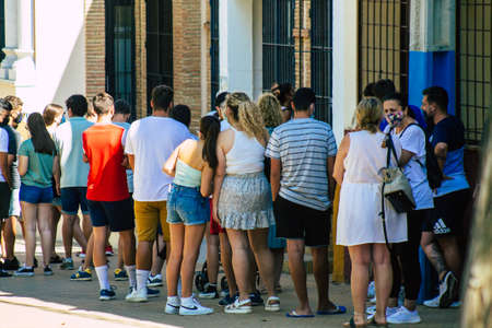 Carmona Spain July 26, 2021 Vacination center of Carmona against Coronavirus, the local people with protective mask waiting to receive the vaccine, open from monday to friday with the collaboration of Civile Protectionのeditorial素材
