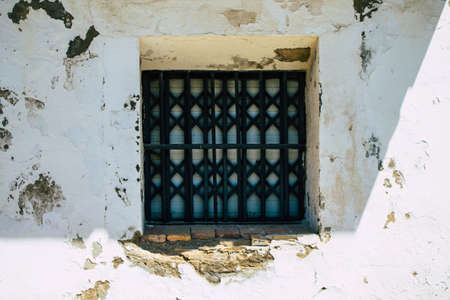 Carmona Spain July 30, 2021 Closeup of window of a old house in the narrow streets in town of...