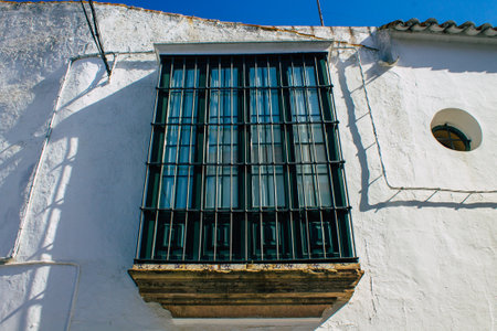 Carmona Spain July 30, 2021 Closeup of window of a old house in the narrow streets in town of Carmona, the town shows a typical narrow and meandering Arabic layoutの写真素材