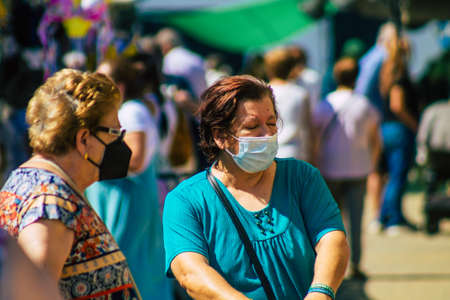 Carmona Spain July 26, 2021 Unidentified Spanish people with face mask shopping at local market in...