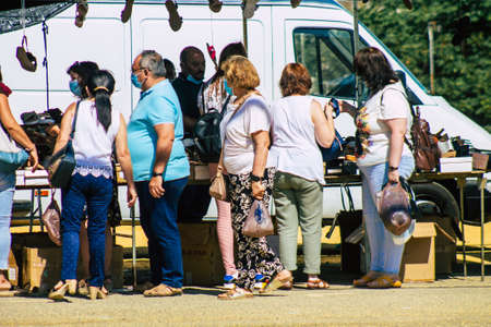 Carmona Spain July 26, 2021 Unidentified Spanish people with face mask shopping at local market in downtown during Coronavirus outbreak hitting Spain, wearing a mask is mandatoryのeditorial素材