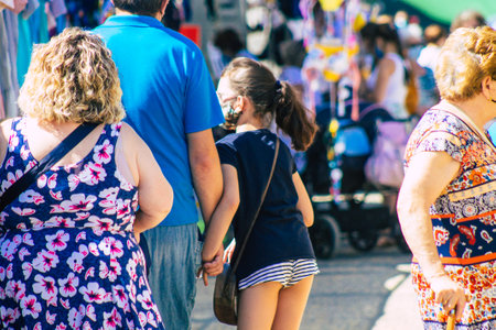 Carmona Spain July 26, 2021 Unidentified Spanish people with face mask shopping at local market in downtown during Coronavirus outbreak hitting Spain, wearing a mask is mandatoryのeditorial素材