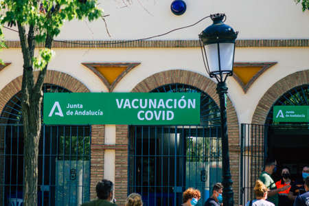 Carmona Spain July 26, 2021 Vacination center of Carmona against Coronavirus, the local people with protective mask waiting to receive the vaccine, open from monday to friday with the collaboration of Civile Protectionのeditorial素材