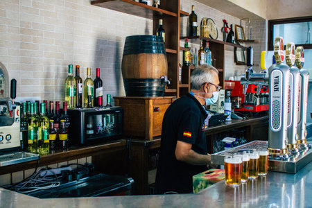 Carmona Spain July 30, 2021 Inside of establishment Resbalon, a wine bar, singular tapas bar located in main street of Carmona, very pleasant terrace for tapasのeditorial素材