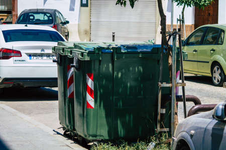 Carmona Spain July 26, 2021 Garbage container in the streets of Carmona called The Bright Star of Europe, the town shows a typical narrow and meandering Arabic layoutのeditorial素材