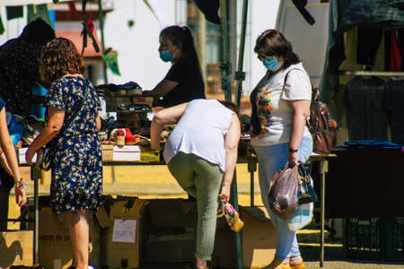 Carmona Spain July 26, 2021 Unidentified Spanish people with face mask shopping at local market in...
