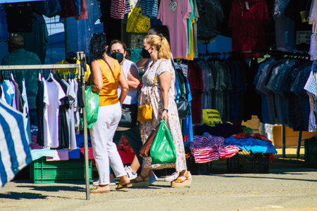 Carmona Spain July 26, 2021 Unidentified Spanish people with face mask shopping at local market in downtown during Coronavirus outbreak hitting Spain, wearing a mask is mandatoryのeditorial素材