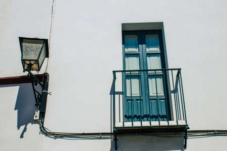 Carmona Spain July 31, 2021 Closeup of window of a old house in the narrow streets in town of Carmona, the town shows a typical narrow and meandering Arabic layoutの写真素材