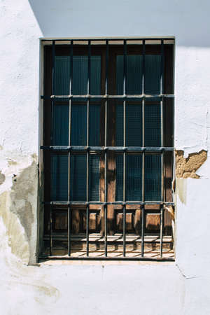 Carmona Spain July 31, 2021 Closeup of window of a old house in the narrow streets in town of Carmona, the town shows a typical narrow and meandering Arabic layoutの写真素材