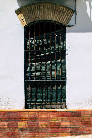 Carmona Spain July 31, 2021 Closeup of window of a old house in the narrow streets in town of...