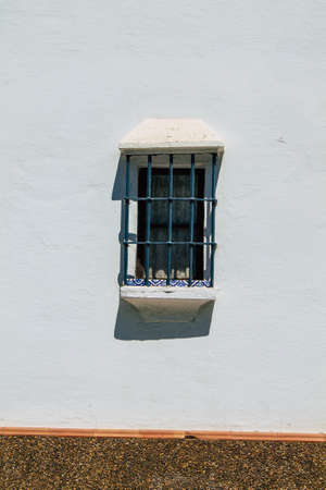 Carmona Spain July 31, 2021 Closeup of window of a old house in the narrow streets in town of...