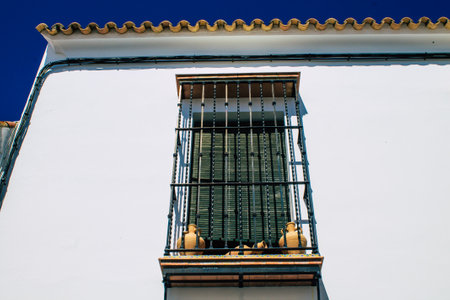 Carmona Spain July 31, 2021 Closeup of window of a old house in the narrow streets in town of Carmona, the town shows a typical narrow and meandering Arabic layoutの写真素材