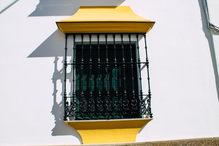 Carmona Spain July 31, 2021 Closeup of window of a old house in the narrow streets in town of...