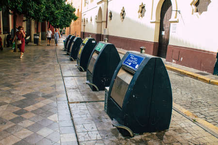 Seville Spain August 11, 2021 Garbage container in the streets of Seville, an emblematic city and...