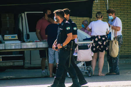 Carmona Spain August 16, 2021 Local police patrolling at Carmona market during the coronavirus outbreak hitting Spainのeditorial素材