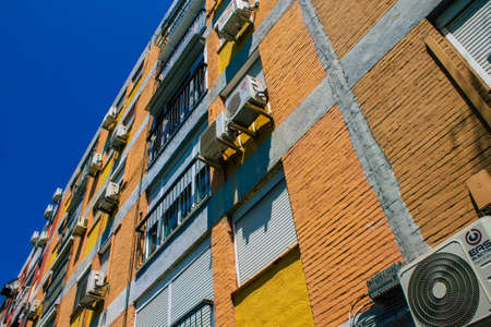 Seville Spain August 21, 2021 AC on the facade of a building in the streets of Seville, an...