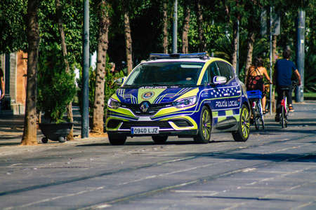 Seville Spain September 04, 2021 Local police car patrolling in the streets of Seville during the...