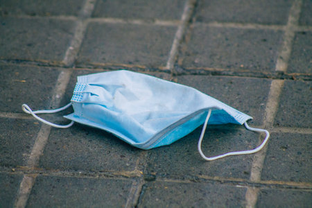 Seville Spain September 04, 2021 Surgical mask to protect against the coronavirus thrown in the streets of Seville during the coronavirus pandemic affecting Spainのeditorial素材