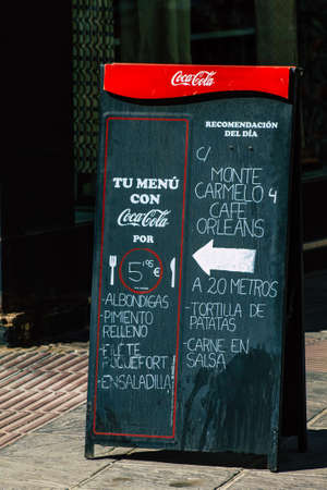 Seville Spain September 04, 2021 Commercial sign front a business located in Seville, an emblematic city and the capital of the region of Andalusia, in the south of Spainのeditorial素材