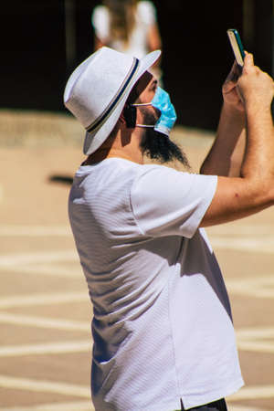 Seville Spain September 04, 2021 Tourists visiting The Alcazar of Seville and its gardens, considered the most brilliant example of Mudejar architecture in Spainのeditorial素材