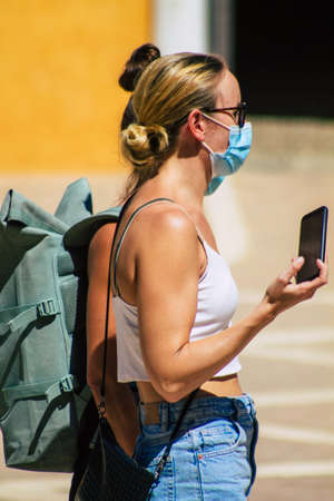 Seville Spain September 04, 2021 Tourists visiting The Alcazar of Seville and its gardens,...