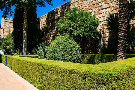 Seville Spain September 04, 2021 The Alcazar of Seville and its gardens is a fortified palace from the Muslim then Christian era. Considered the most brilliant example of Mudejar architecture in Spainのeditorial素材