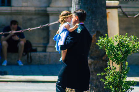 Seville Spain September 04, 2021 People from a traditional wedding walking in the streets of Seville during the coronavirus outbreak hitting Spainのeditorial素材