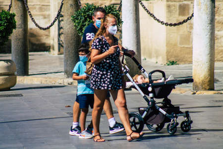 Seville Spain September 04, 2021 Pedestrians walking in the street during the coronavirus outbreak...