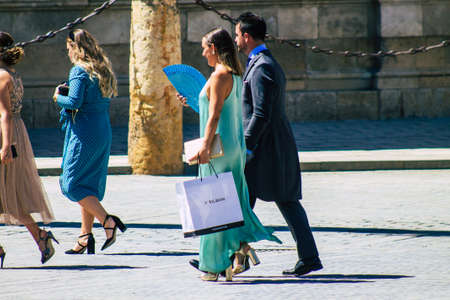 Seville Spain September 04, 2021 People from a traditional wedding walking in the streets of Seville...